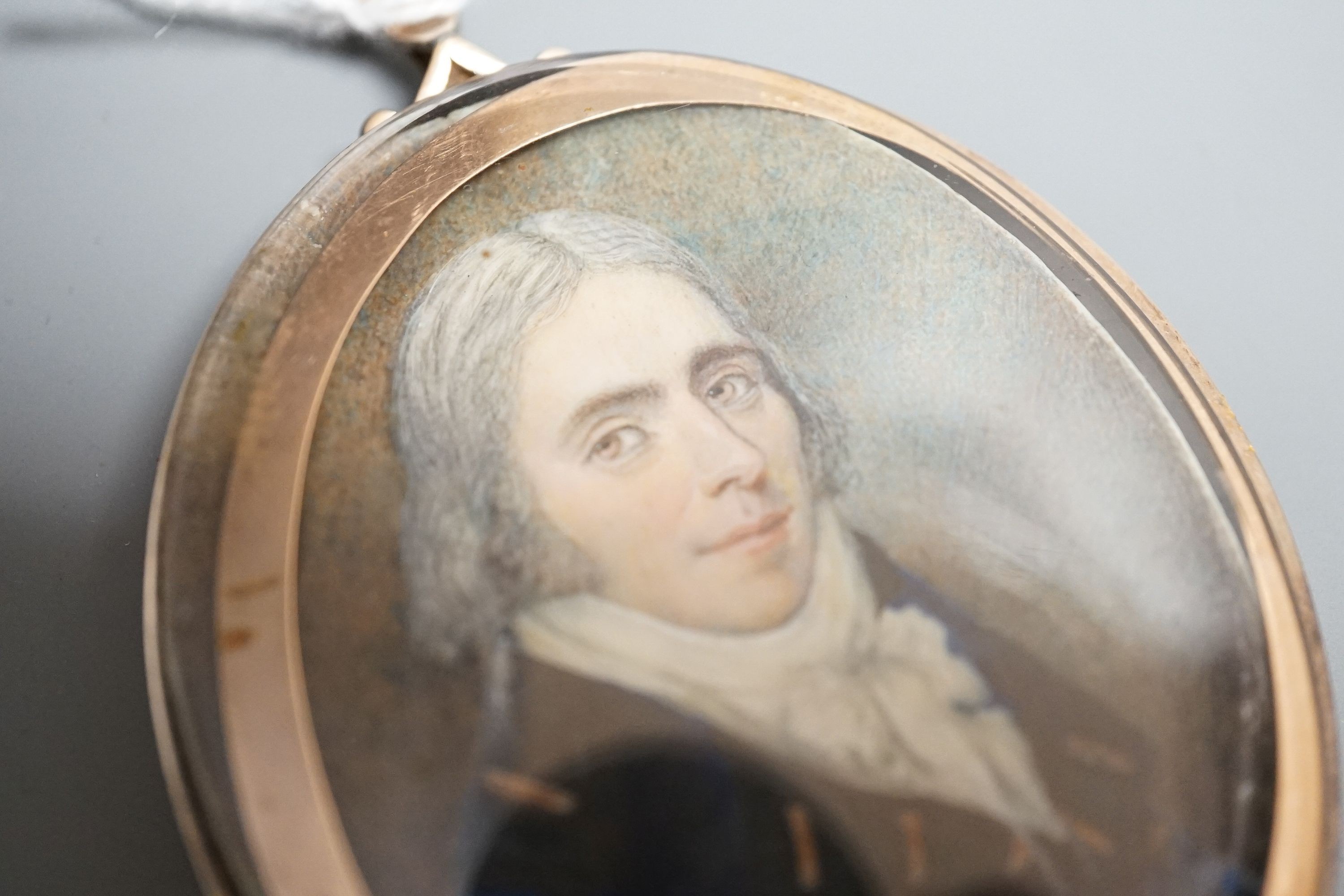 A 19th century portrait miniature on ivory of a gentleman in naval uniform, height 7cm